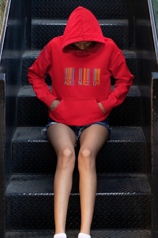 hoodie mockup of a young woman sitting on some steps 33744 7