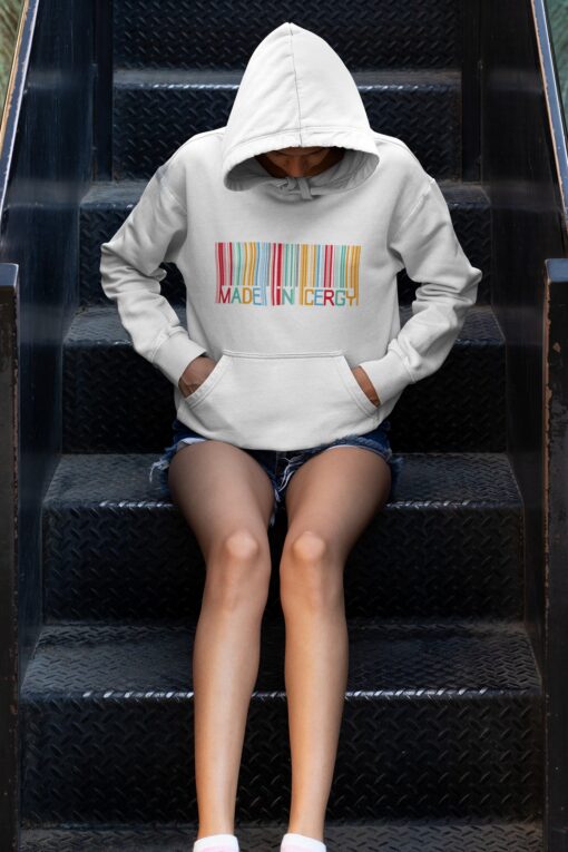 hoodie mockup of a young woman sitting on some steps 33744 8