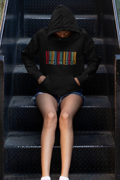 hoodie mockup of a young woman sitting on some steps 33744 9